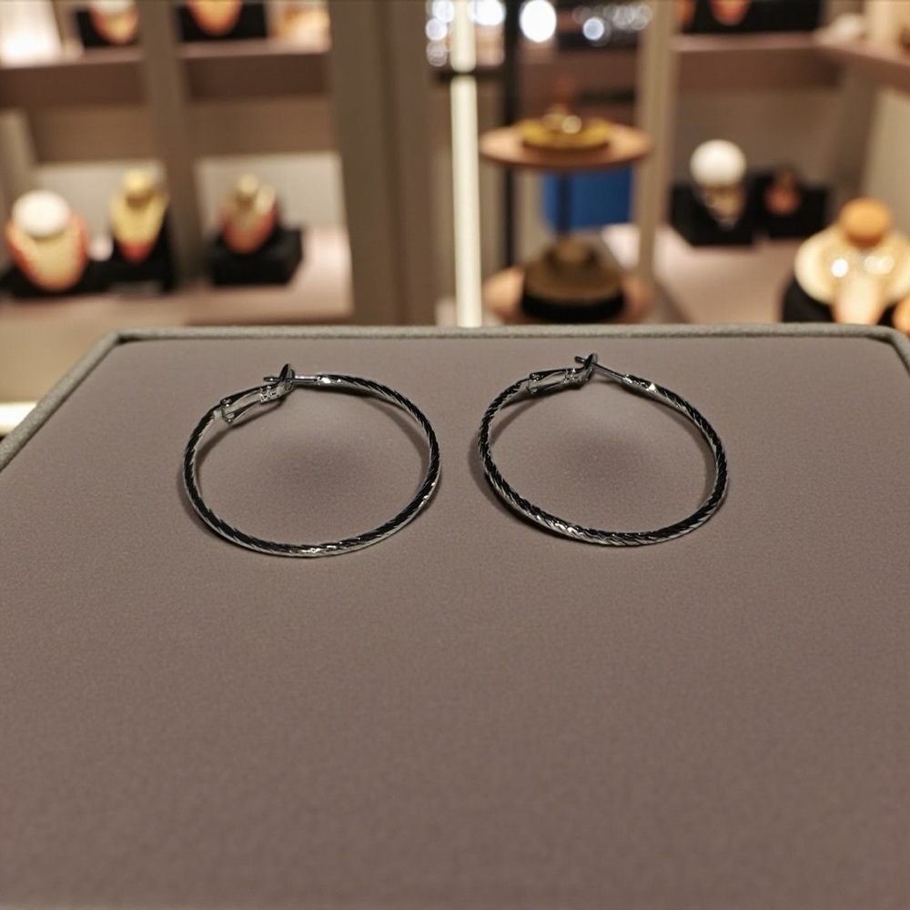 Silver Hoop Earrings with a Twist Textured